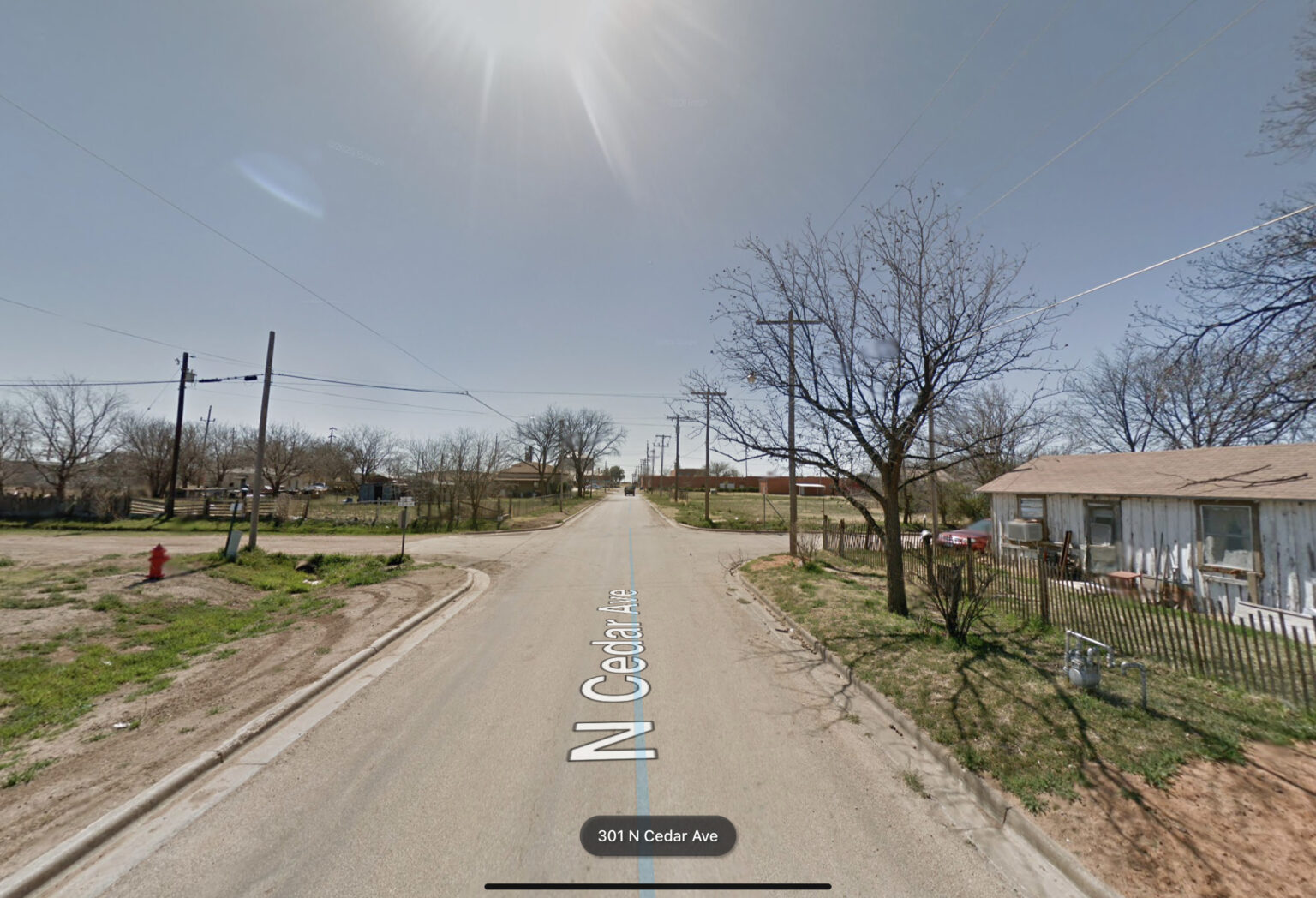 Fixer house in Downtown Munday , Texas LAND IS HOME